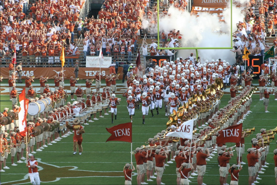 Texas Longhorns make their entrance onto the field on opening day. As the college championship season came to a close, the dynamic of the teams drastically changed. 