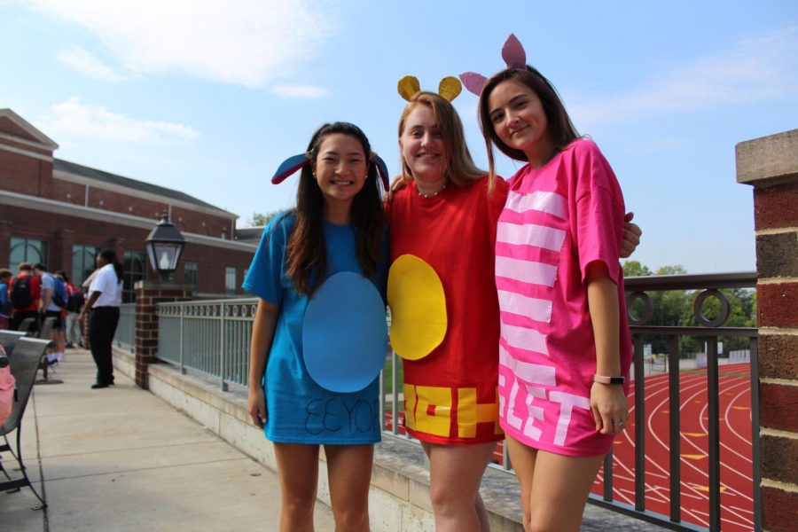 SENIORS Camille Huyghues-Despointes Riley Brandenburg and Annie Jackson dressed as characters from Winnie the Pooh on character day. The second day of spirit week the theme allowed students to dress up as cartoon characters, T.V. characters and be creative.