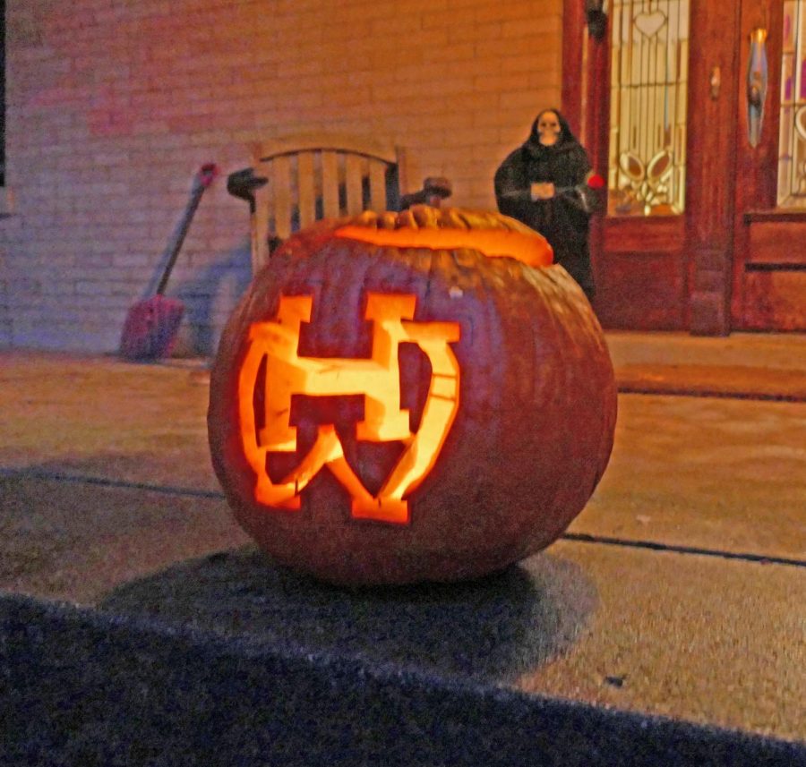 Eito Schwartz, 21, carved the WHHS logo into his pumpkin for Halloween. WHHS students of every grade celebrated the holiday with parties, movies, and lots of candy.