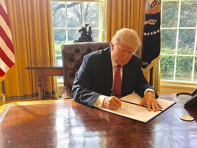 Trump signs an Executive Order in the Oval Office. At the beginning of his term, Trump signed an average of 1.5 orders per day. 