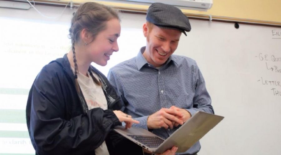 AP Literature and Composition teacher Jake Riordan helps SENIOR Isabelle Brandicourt (right) and Louis Martini, ‘20 (left), with ideas for a project. Riordan worked closely with his students during second quarter as they completed a comprehensive poetry study, including guiding them as they wrote poems in the style of a living poet and then sent their poem to the poet.