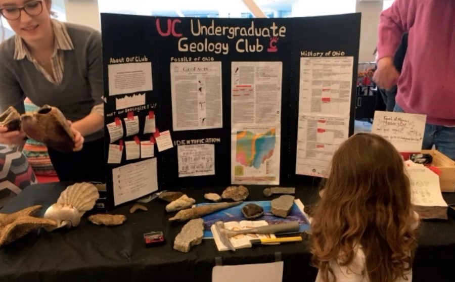 In addition to the student-devloped presentations, University of Cincinnati had a host of exhibitions and projects to display to possible prospective students. One such presentation was the UC Undergraduate Geology Club, whose poster board and lots of Geology-related materials were there for viewing.