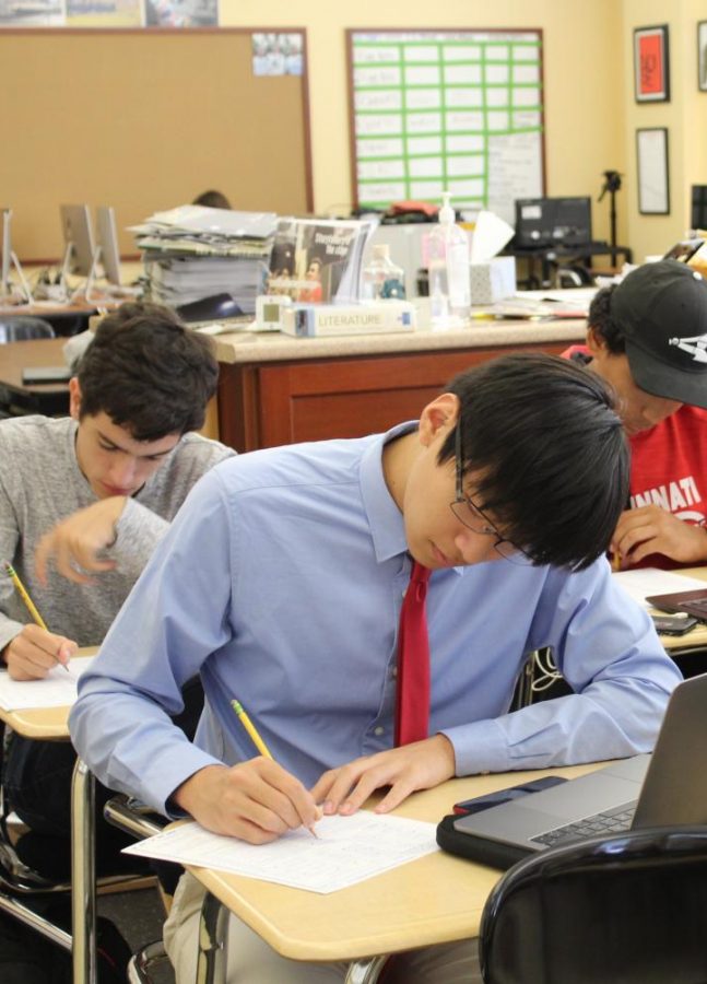 SENIOR Alan Zhang bubbles in his personal information, a process that may be phased out completely with this new ACT format. Zhang was one of the 17 WHHS students who got a perfect score on the ACT last school year.