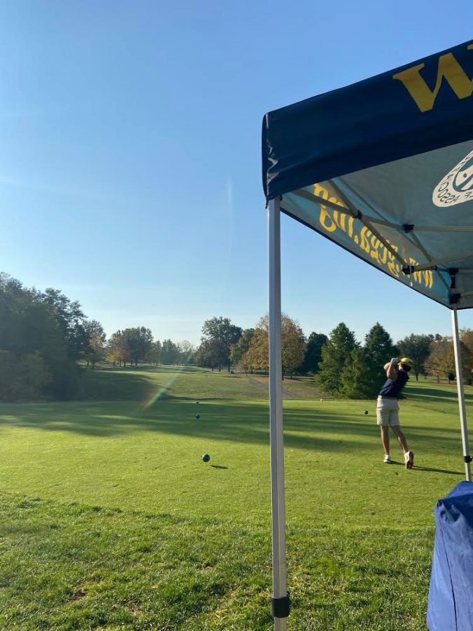 Golf player SENIOR Oliver Cohen takes a swing.  “Its a great game that teaches patience, discipline, and decision making,” coach Zach Heeney said.
