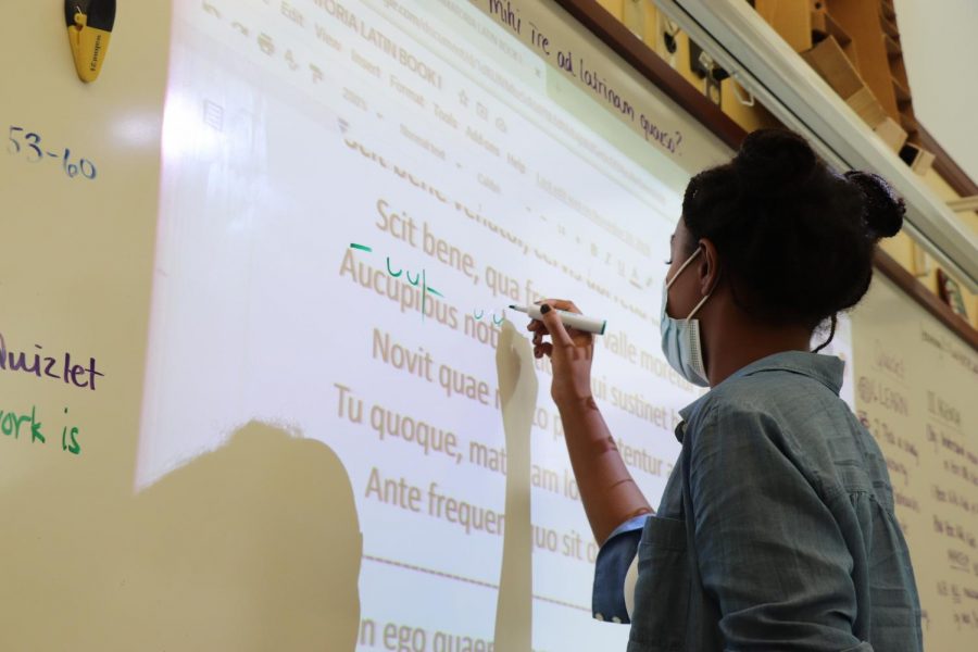 Students in Laura Brogden’s 8th bell, AP IV Latin practice translations on the board. This year her Latin 3 classes are reading the Hercules stories. She plans on incorporating stories about people in the ancient world that aren’t typically found in textbooks.