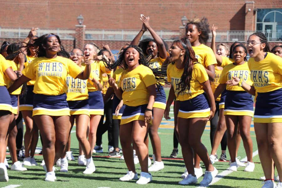 During the homecoming pep rally the spirit program came together to perform to a mashup of songs on Marx Field. The spirit program is made up of the cheerleaders and WHHS’s dance team: The Golden Girls. 