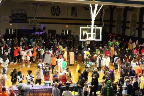 The Boogie Bash began as a success with seventh and eighth graders coming over to boogie no one was left costumeless. 