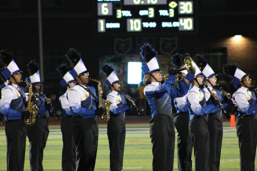 The+wood+winds+playing+during+the+halftime+performance.+WHHS+Blue+and+Gold+marching+band+playing+at+the+homecoming+halftime+show+with+their+woodwinds+instruments.