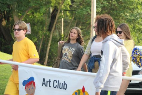 The WHHS art club, who previously worked with the Cincinnati Childrens Hospital to paint 180 wooden circles for their new critical care emergency unit in early 2020, walked in the Homecoming parade on Friday, Sep. 16.