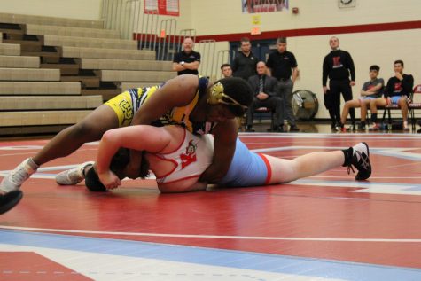 Junior powerhouse Dezmond Gayle cranks his opponent over to add on to his impressive record.
