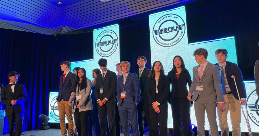 The top 10 teams in Business Financial Plan await for their final results to be announced by Ohio FBLA president, Jesus Flores-Morales. Two teams from WHHS qualified for nationals.