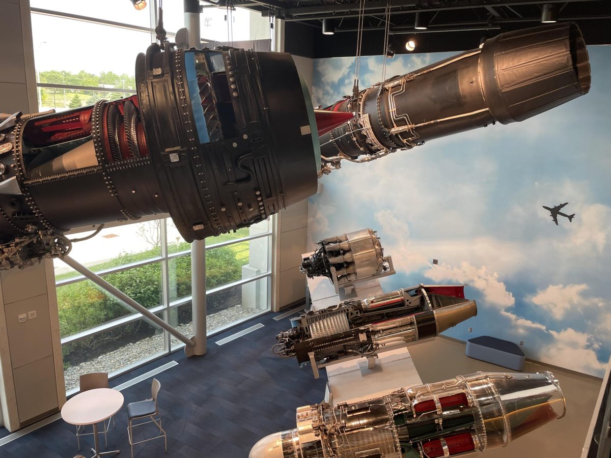 Airplane engines hang from the ceiling of the GE Aerospace Learning Center in Evandale, Ohio.