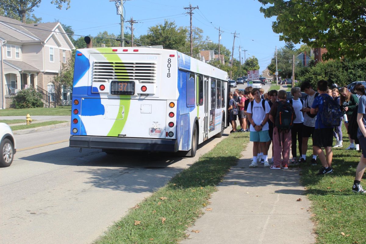 Students scurry from classes each day to catch their Metro bus ride home.
