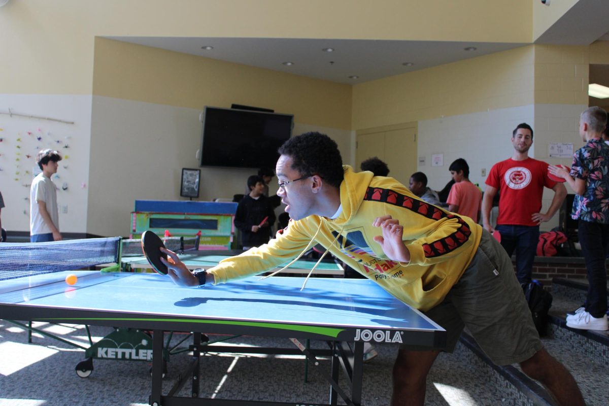 Ping Pong Club member, James Overton, playing a match during one of the club’s weekly meetings. 
