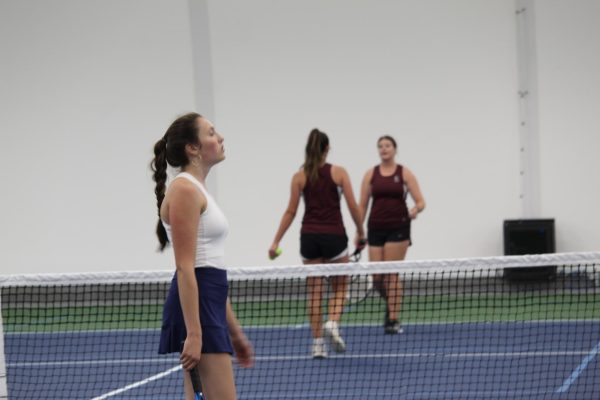 Lizzy Rebber, ‘24, taking lots of CCP classes, doesn’t usually affect her workload playing tennis. “It [Tennis] gives me a solid schedule in a team and community, its very supportive because we all have the same end goal as people and teammates.” Rebber said.