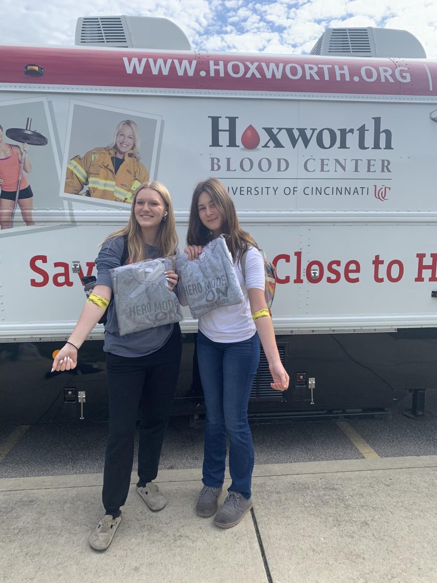 Charlotte+Long%2C+%E2%80%9825+and+Greta+Koehn%2C+%E2%80%9825+pose+in+front+of+the+Hoxworth+Bloodmobile+after+donating+blood.+%E2%80%9CAnybody+who+donated+or+tried+to+donate%2C+even+if+they+got+there+and+couldn%E2%80%99t%2C+got+a+%5Bfree%5D+sweatshirt+from+Hoxworth%2C%E2%80%9D+John+Caliguri+said.%0A