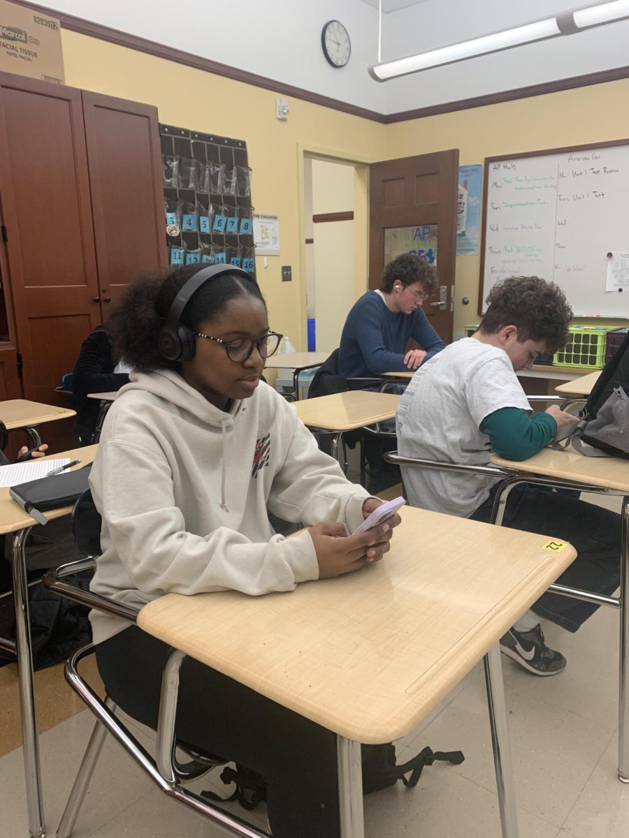 Geovanna Schandorf, ‘26, spends time on her phone and listens to music during a break in class.

 “I think the use of phones and other technology in classrooms is going to increase as time goes on,” Claudia Zilliox, ‘29, said.
