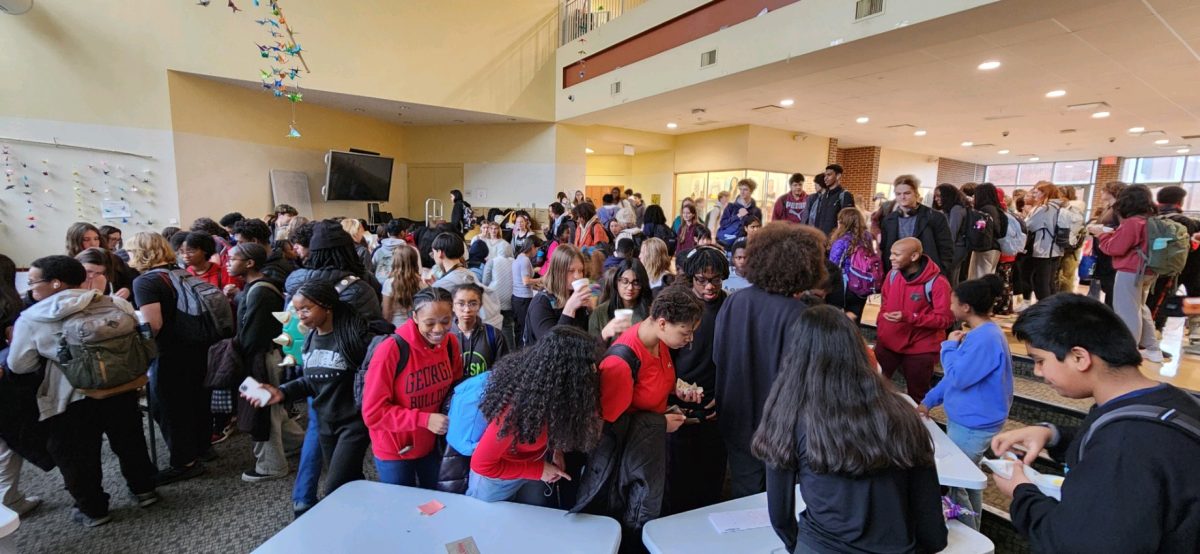 Hundreds of students walk around the Forum trying different cultural foods. “I absolutely ran out of food,” Lauren McGill said. “Quickly. We were told to feed at least 20 people and it was gone.”