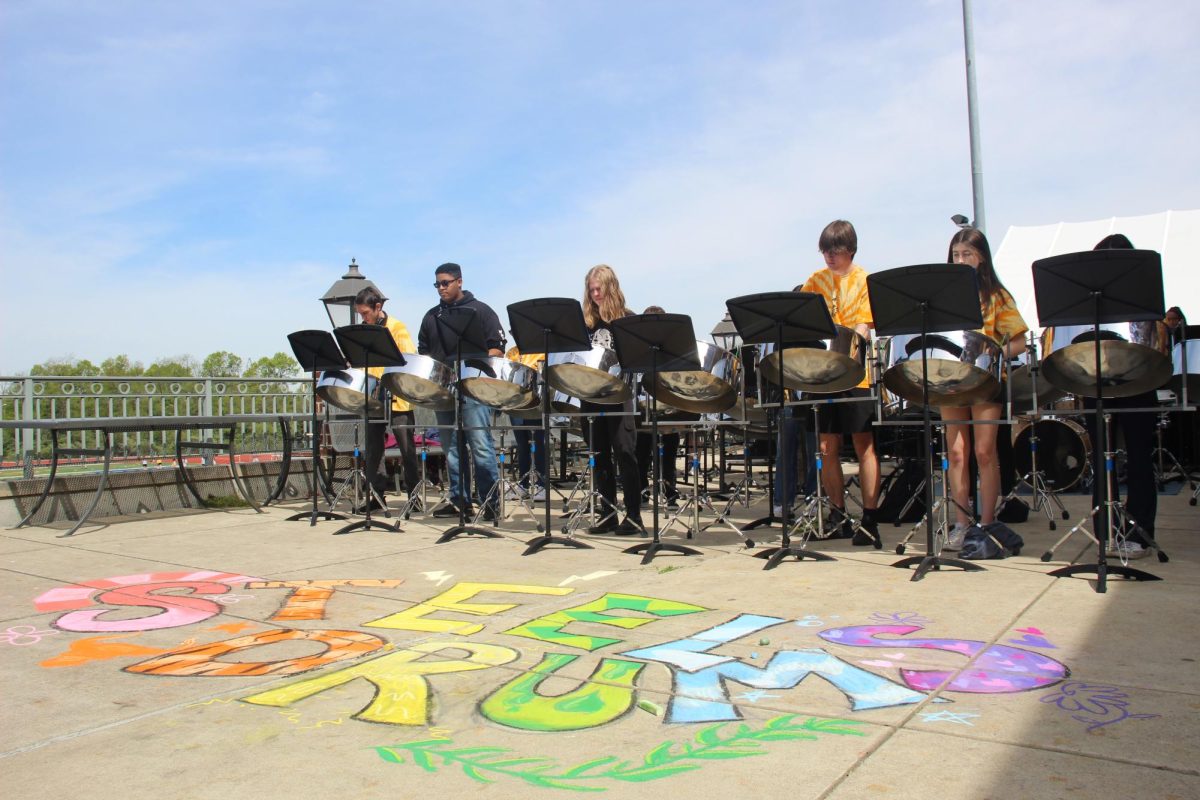 Steel drum bands perform at Chalk Drawing.