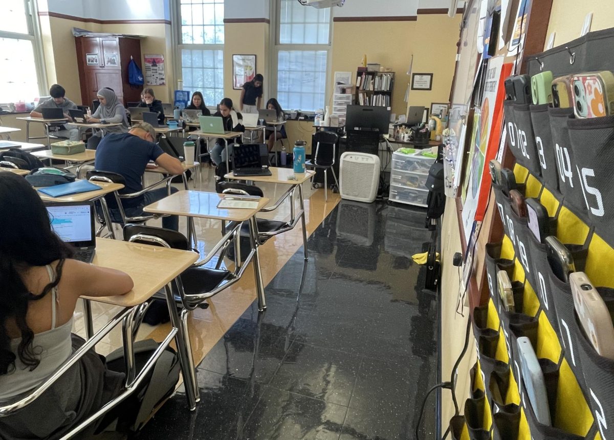  Students in this classroom remain hard at work, while their phones are up in pouches.

