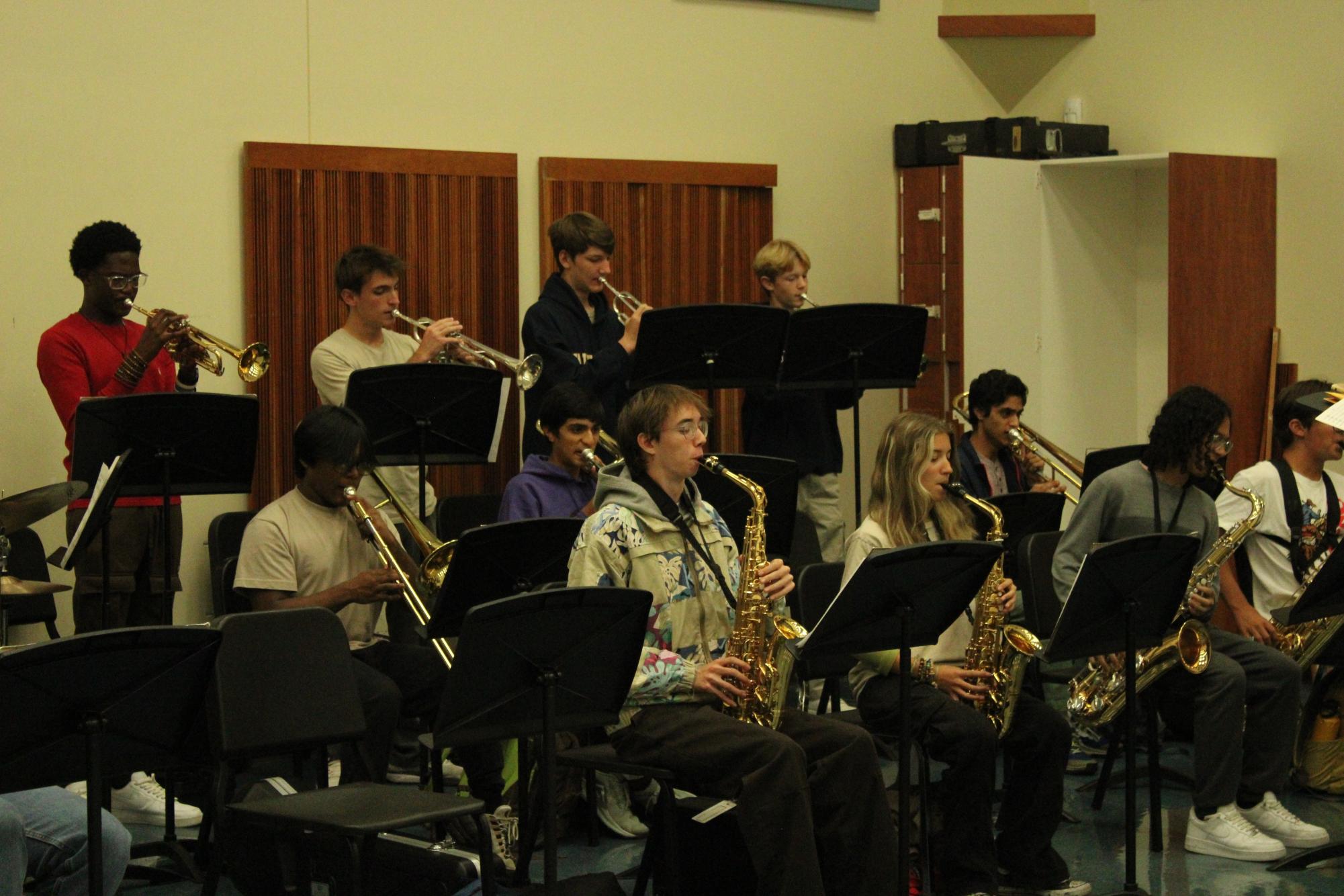 In preparation for their performance, members of the jazz ensemble run through their music, polishing every last detail. This group focuses more on perfecting the jazz style and less on learning how to play the instruments. “It is a higher-level band class at Walnut that specializes in playing jazz and other subcategories of jazz,” Milo Althoff, ‘27, said.