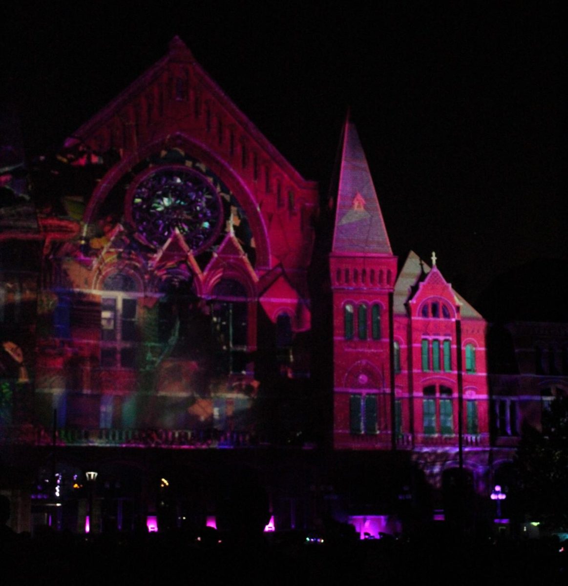  Crowds gathered outside of Music Hall to watch the light show that was projected onto the building. This exhibit had four different projections, created by Chaske, Haverkos, Susan Kosti, Lightborne and AVextened. 