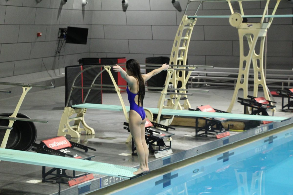 Diving team practices three times a week, previously at UC but now at the Delhi Swim center.