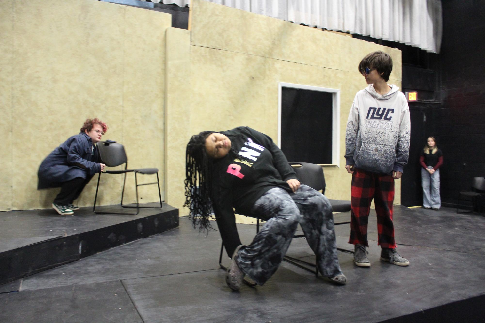 Sami Ray, ‘28, Naomi Madaris, ‘28, and Elliot Howard, ‘27, get serious during rehearsal for Tenfest: Man vs. Machine.
