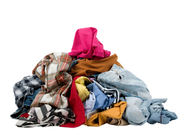 A pile of used clothes gone to waste and making fast fashion pollution even worse.