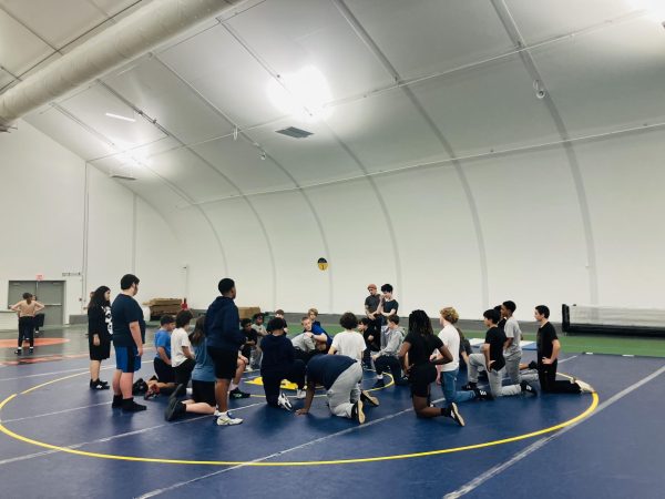 United by one goal the wrestling team shows that teamwork and trust are the foundation of every victory. “I think [the camp] gave us all an introduction to the season and allowed us to get to know each other,” Chloe Sommer, ‘25, said.