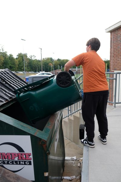 Joe Bourgeois, '26, volunteers with Sustainability Club to earn service hours for AP Government.