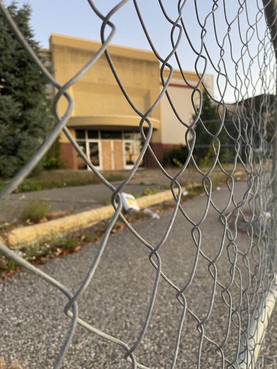 The Cincinnati Mall, once a major and striking mall in Cincinnati, now fenced off and forgotten as demolition begins on the site.