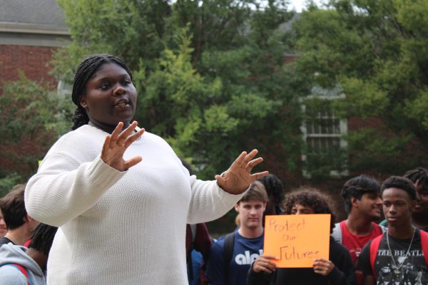 Shaylin King, '26, one of the lead coordinators of the walkout, speaks to the crowd. “We care. We stand with them in legislation, and we will try to advocate, and we will continue to advocate for it.”