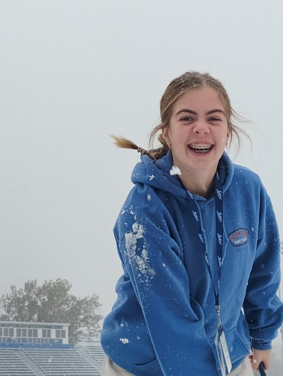 Spencer Brogan, ’29, and other members of The Chatterbox staff enjoy the unexpected snowfall on Monday.