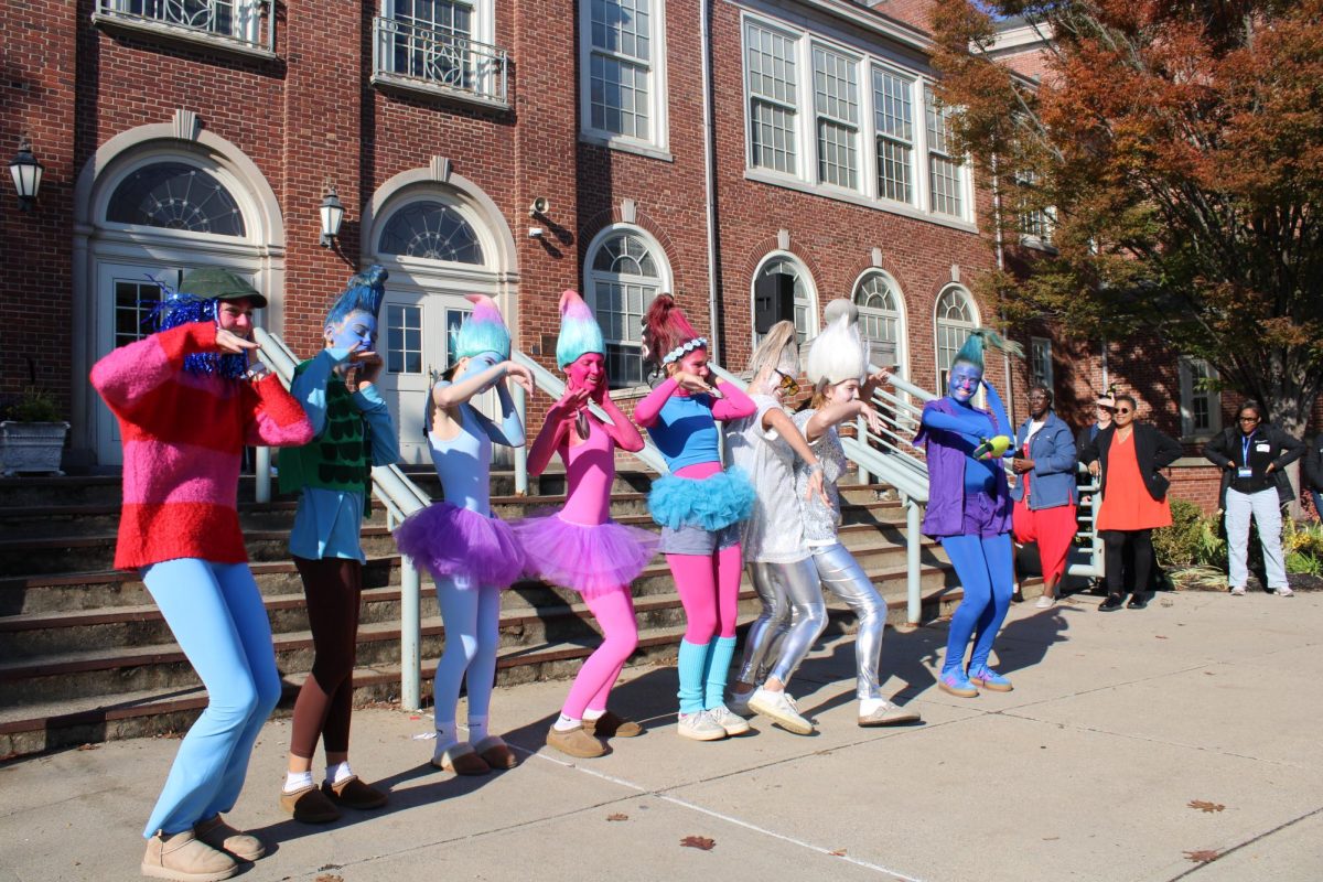 The SENIOR Trolls display their costumes at the Senior Halloween Costume Contest.