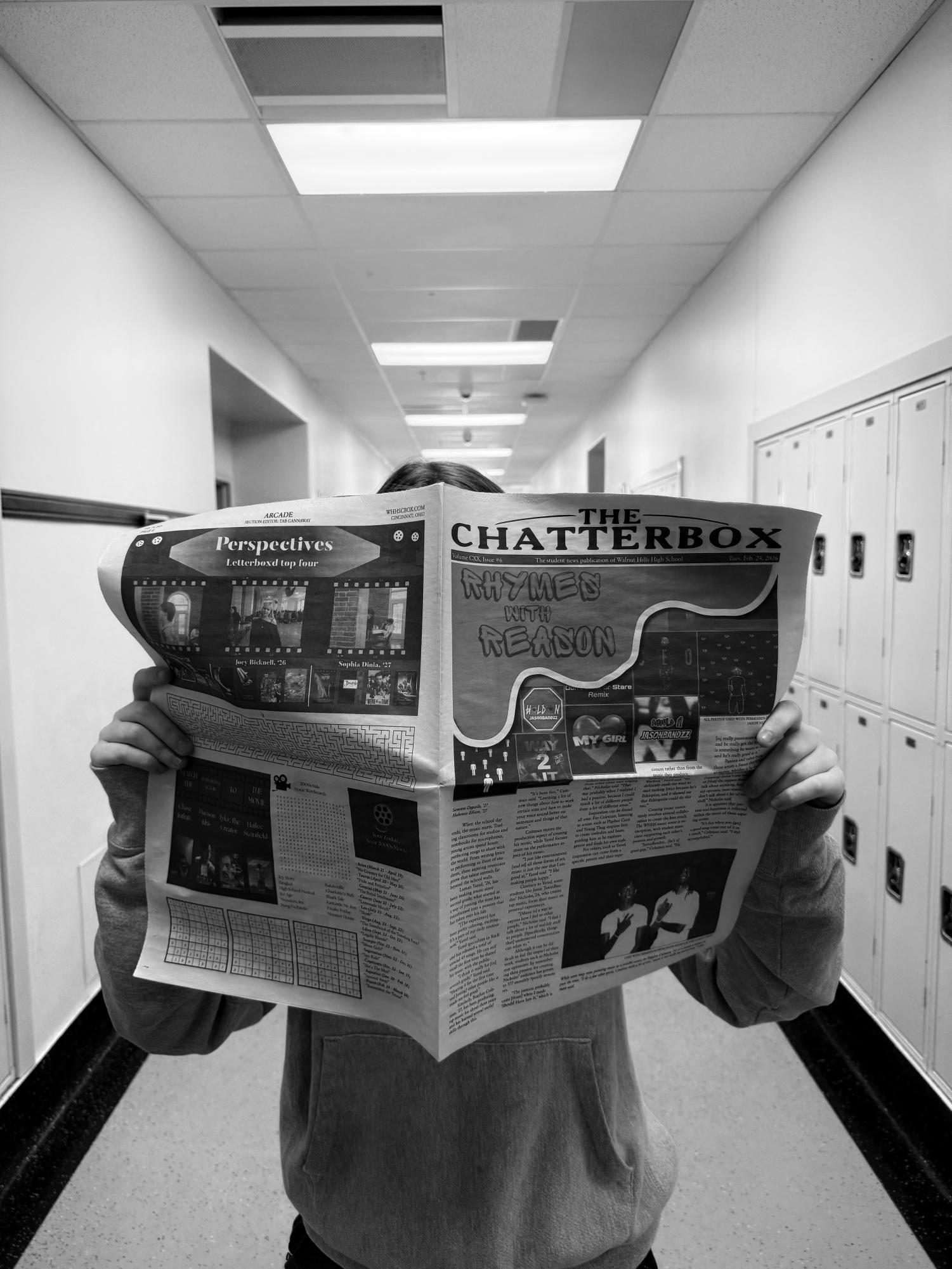Fiona Kelley, '28, reading issue six of The Chatterbox, representing the few who still chose to read newspapers in the modern world.