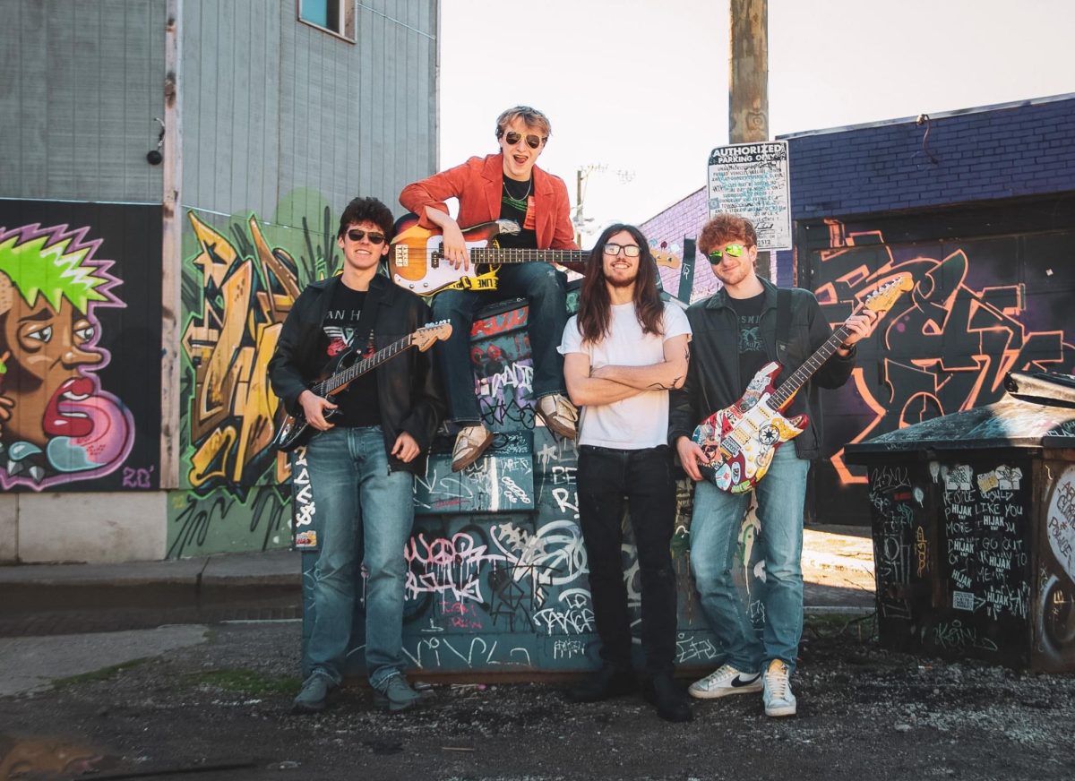 Finn Riordan, ‘26, is the co-founde, singer and guitarist of Hot Rileys. “He’s versatile,” Clark Sayre, ‘26, said. “I’ve heard him sing in choir, but I’ve also heard him sing like rock music he’s able to do both so well… But if you played two recordings of him singing in those different styles, you wouldn’t even know they were the same person, so he really can use his voice in amazing ways.”
Photo used with permission from Finn Riordan