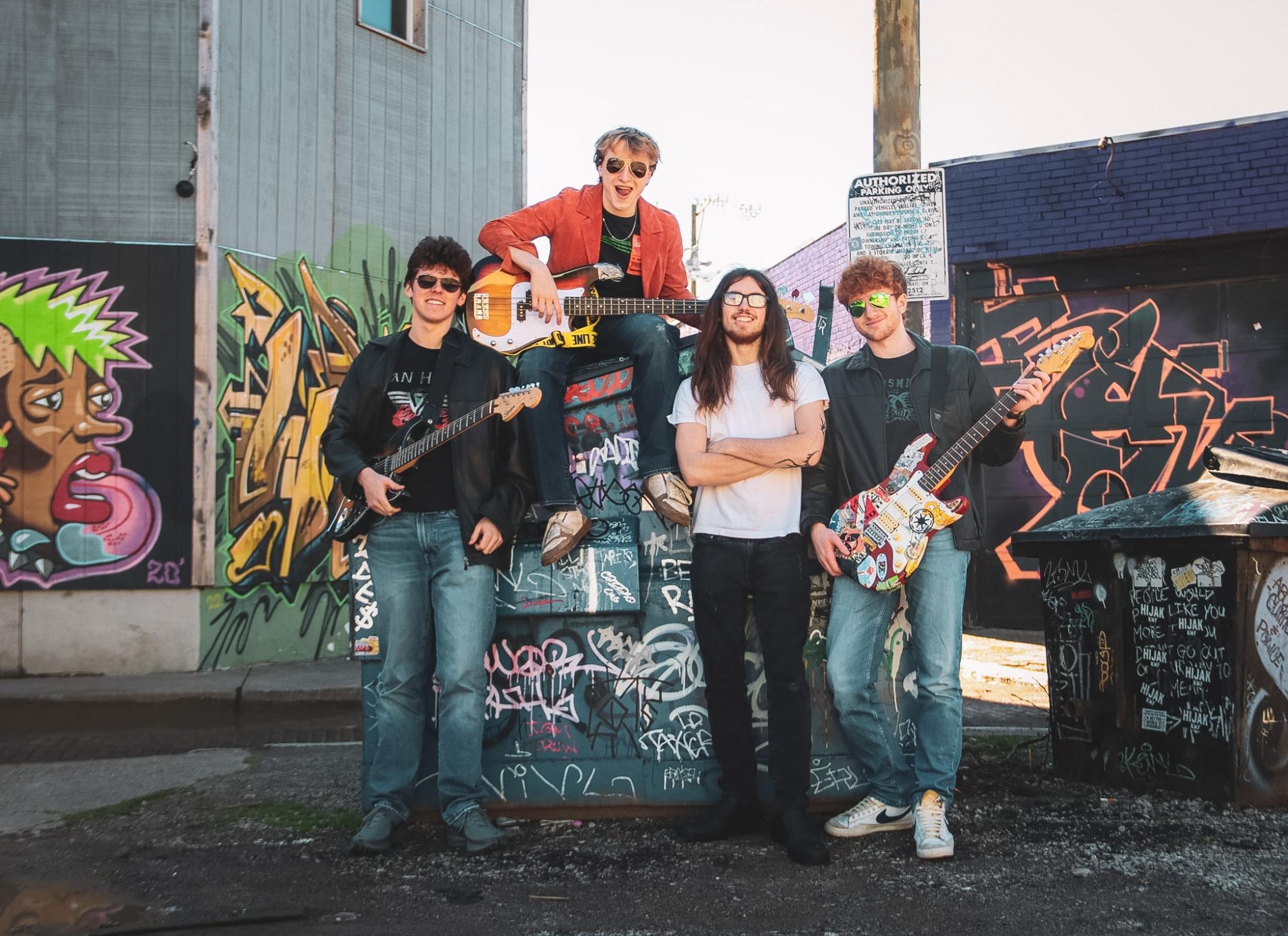 Finn Riordan, ‘26, is the co-founde, singer and guitarist of Hot Rileys. “He’s versatile,” Clark Sayre, ‘26, said. “I’ve heard him sing in choir, but I’ve also heard him sing like rock music he’s able to do both so well… But if you played two recordings of him singing in those different styles, you wouldn’t even know they were the same person, so he really can use his voice in amazing ways.”
Photo used with permission from Finn Riordan
